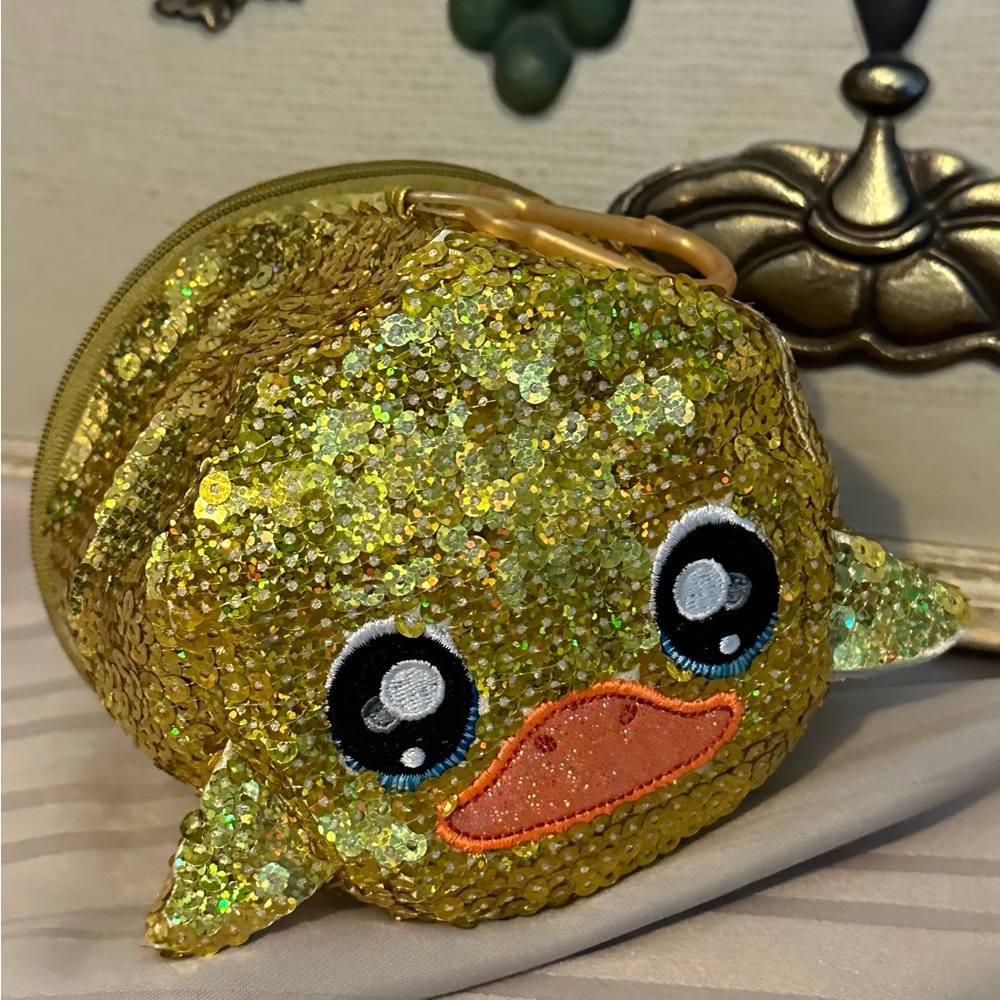NWT Na! Na! Na! surprise small gold sequence duck purse.